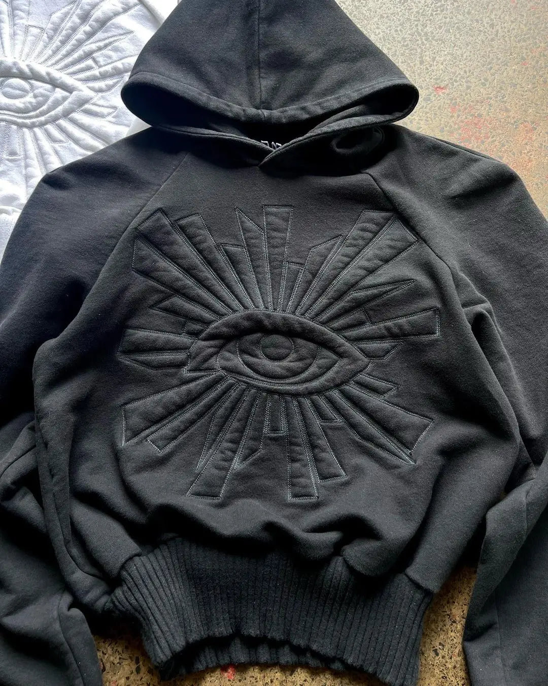 Men's Black Embroidered Eye Sunburst Hoodie - primary lifestyle photo