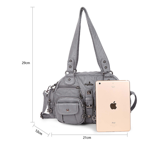 Women's Distressed Black Multi-Pocket Shoulder Bag - alternate view, shown with a person (2 of 2)