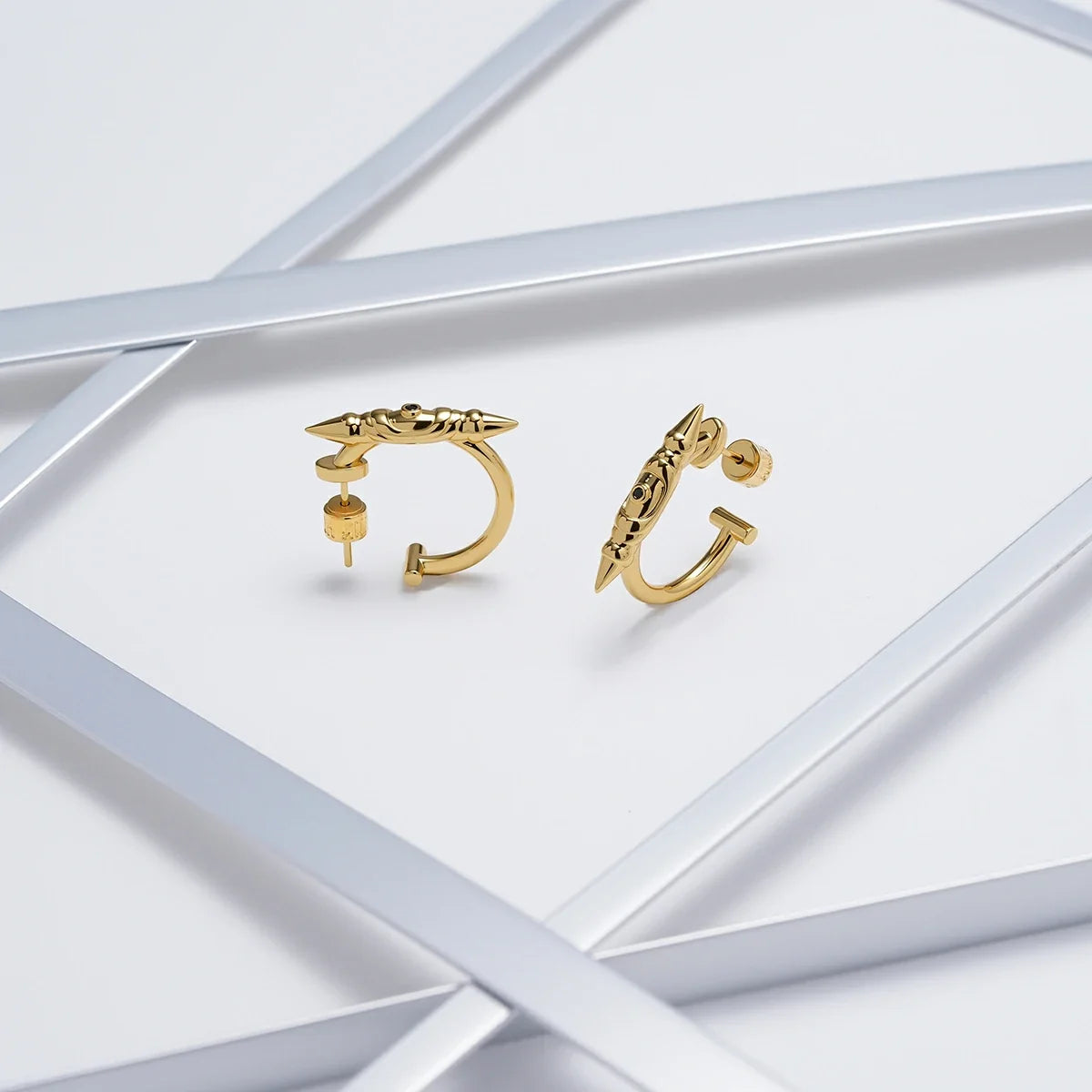 LAMINAR AXIS SPIKE EARRINGS
