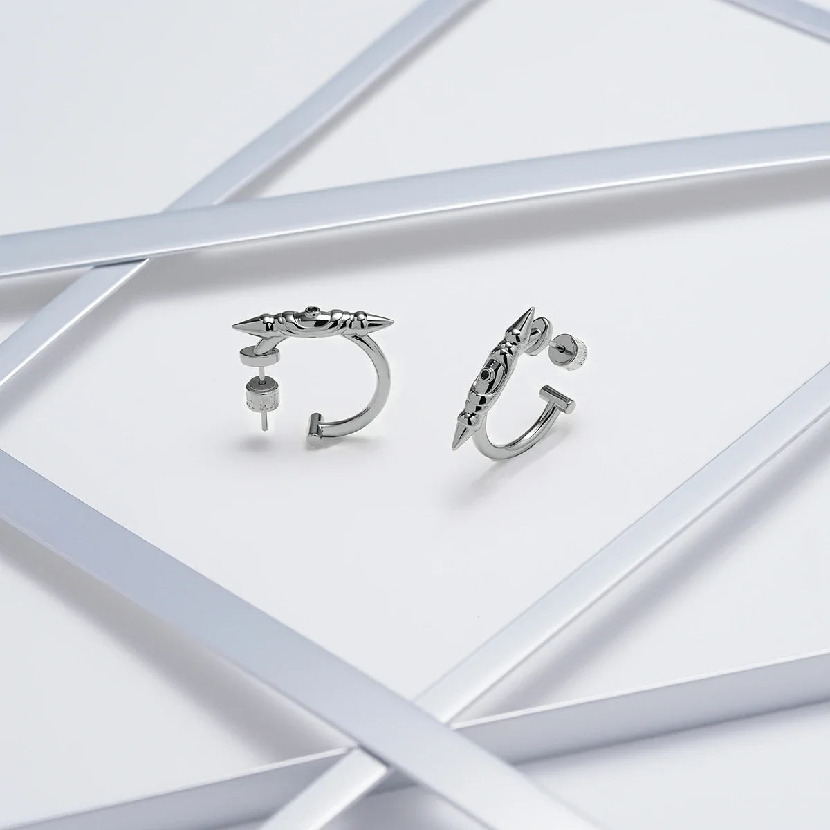 LAMINAR AXIS SPIKE EARRINGS