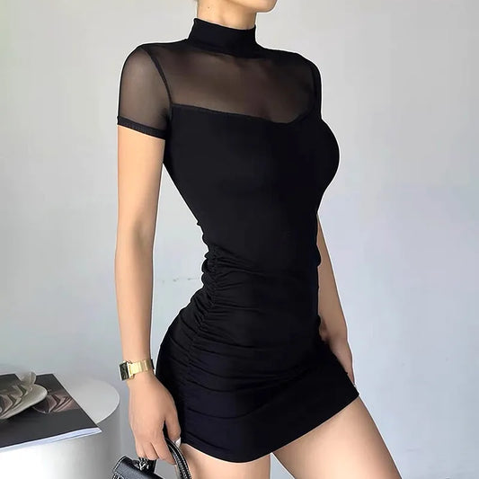 Women's Black Mesh Mock-Neck Ruched Mini Dress - primary photo, shown with a person (1 of 3)