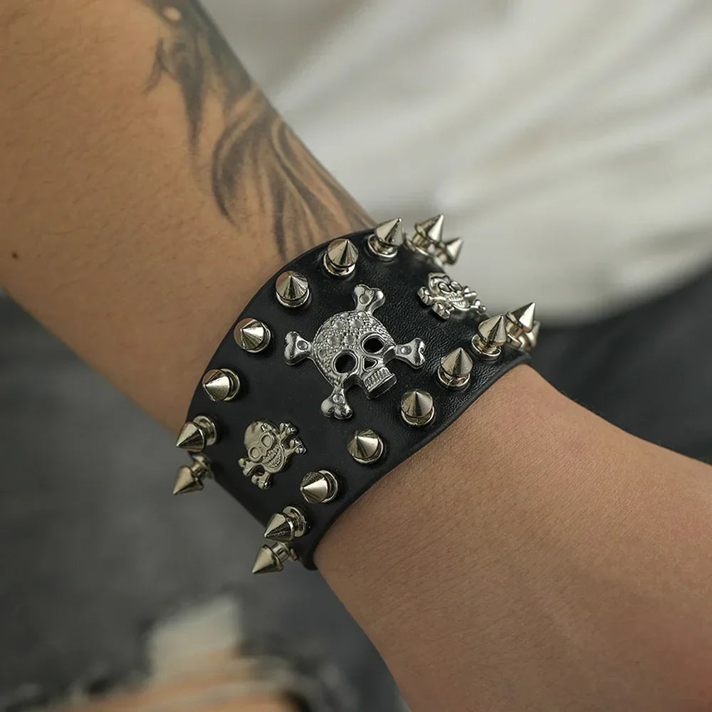 Men's Black Faux Leather Spiked Skull Cuff - primary photo, shown with a person (1 of 3)