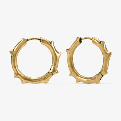 Gold-tone Ancient Thorn Hoops feature thorn-shaped spikes and an antiqued finish.