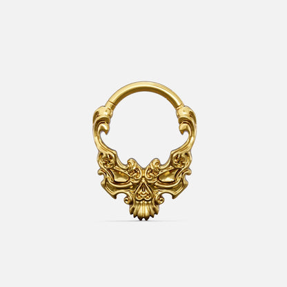 Gold-tone Baroque Skull Clicker with a sculpted skull centerpiece and ornate baroque detailing.