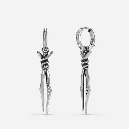 Silver-tone Bound Twin Earrings feature bound twin spike pendants and a hammered hoop design.
