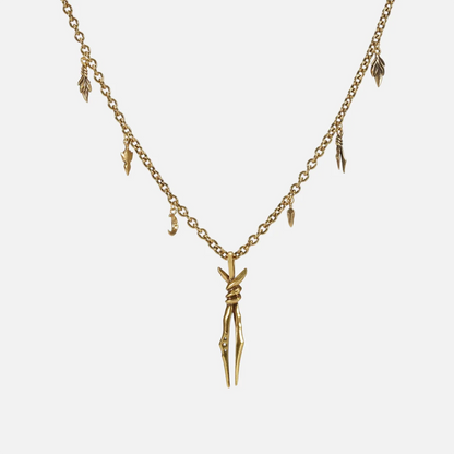 The gold-tone Bound Twin Necklace features a twin spike pendant and an antiqued charm chain.