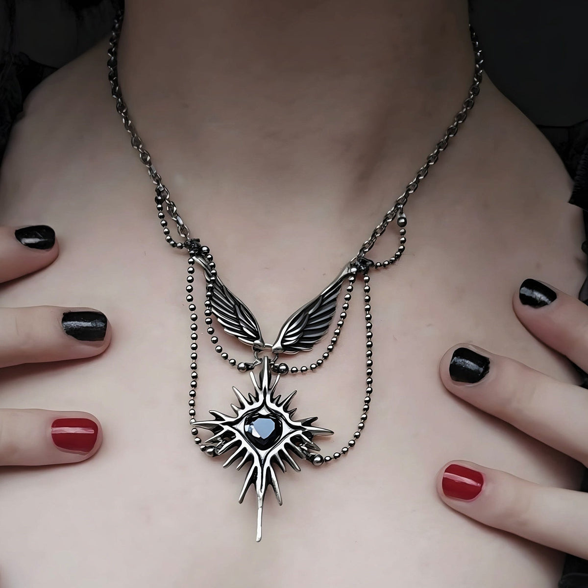 CELESTIAL STARBURST WINGS NECKLACE