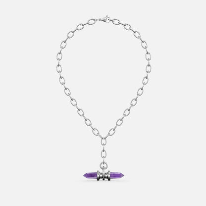Silver-tone chain necklace with a purple crystal prism pendant wrapped in metal rings, shown flat against a plain background