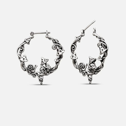 Silver-tone Enchanted Forest Whimsy hoop earrings with mushrooms, leaves, and woodland details