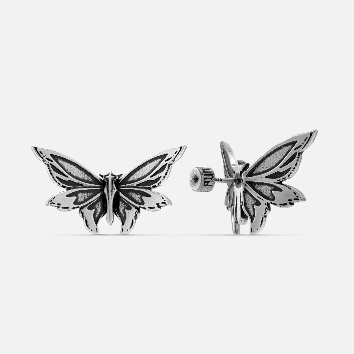 Silver-tone Eternal Moth stud earrings with engraved wings and a sculpted body