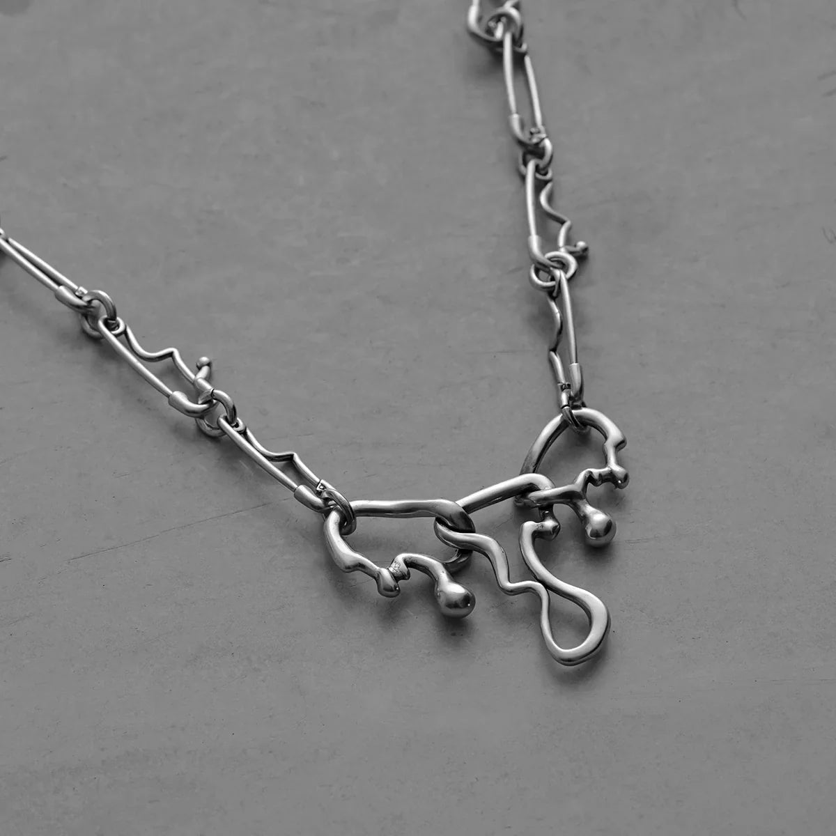 FLUID PIN NECKLACE