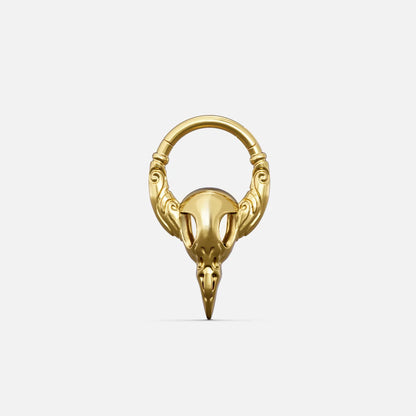 Gold-tone Gothic Raven Clicker with a sculpted raven skull, pointed beak, and decorative ring details.