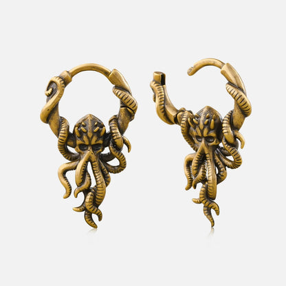 Pair of antique gold-tone hoop earrings featuring a kraken skull with tentacle wrap design