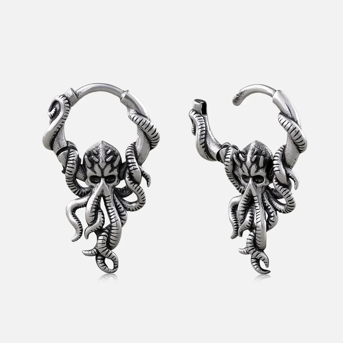 Silver-tone Kraken Mystique hoop earrings with detailed octopus pendants