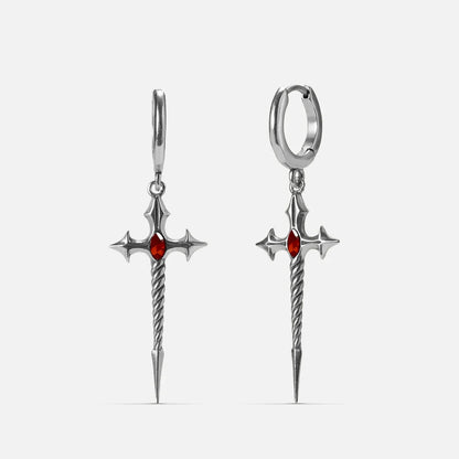 Silver-tone Longinus Godpiercer earrings with red stones, twisted shafts, and spear points