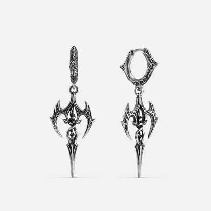 Silver-tone Longinus Halo Piercer earrings with ornate winged blade pendants