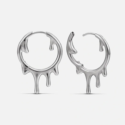 Molten Drop Earrings in 925 sterling silver, pair shown front and side on white, highlighting the sculpted molten-drip hoop s