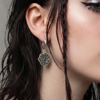PETRIFYING GAZE DANGLE EARRINGS