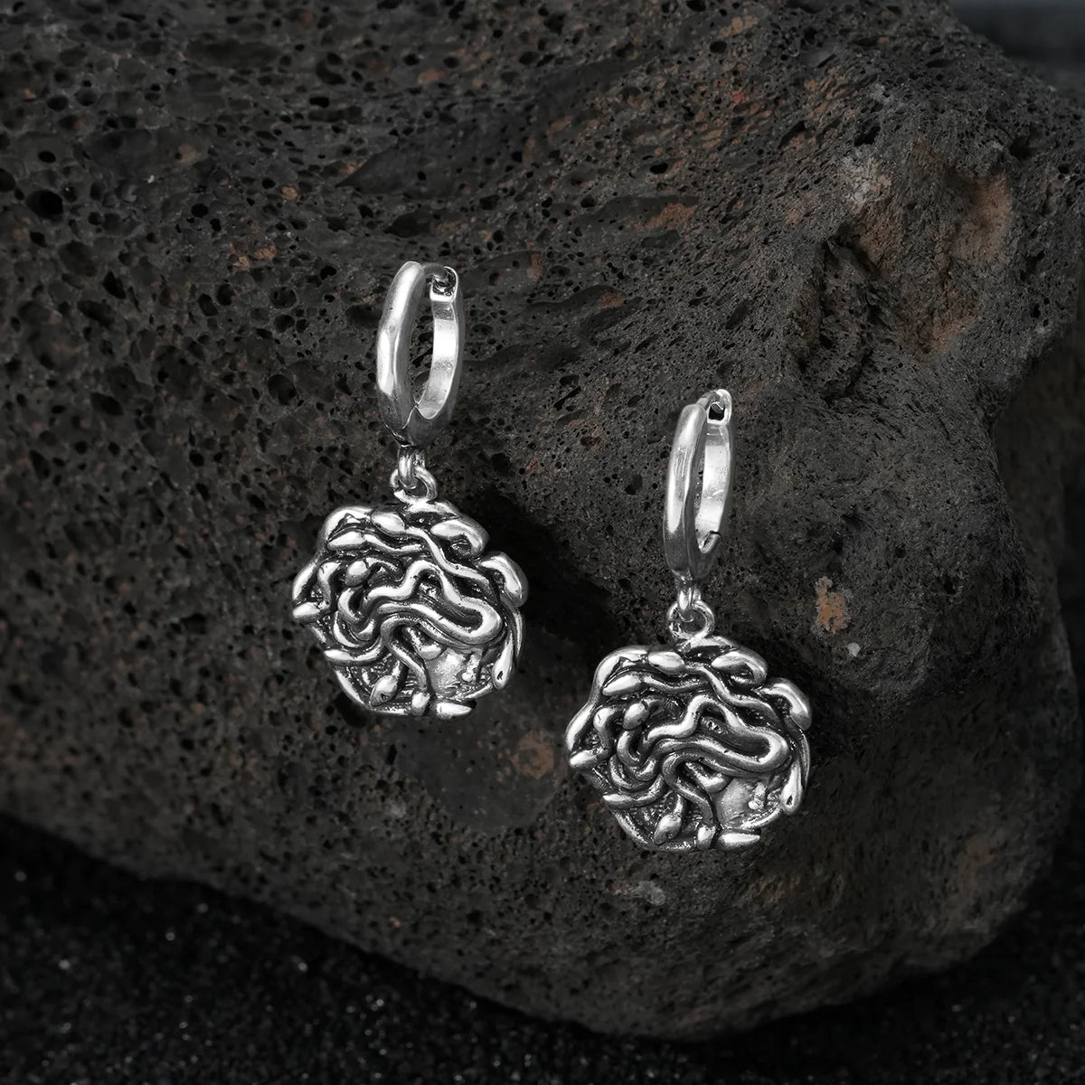 PETRIFYING GAZE DANGLE EARRINGS