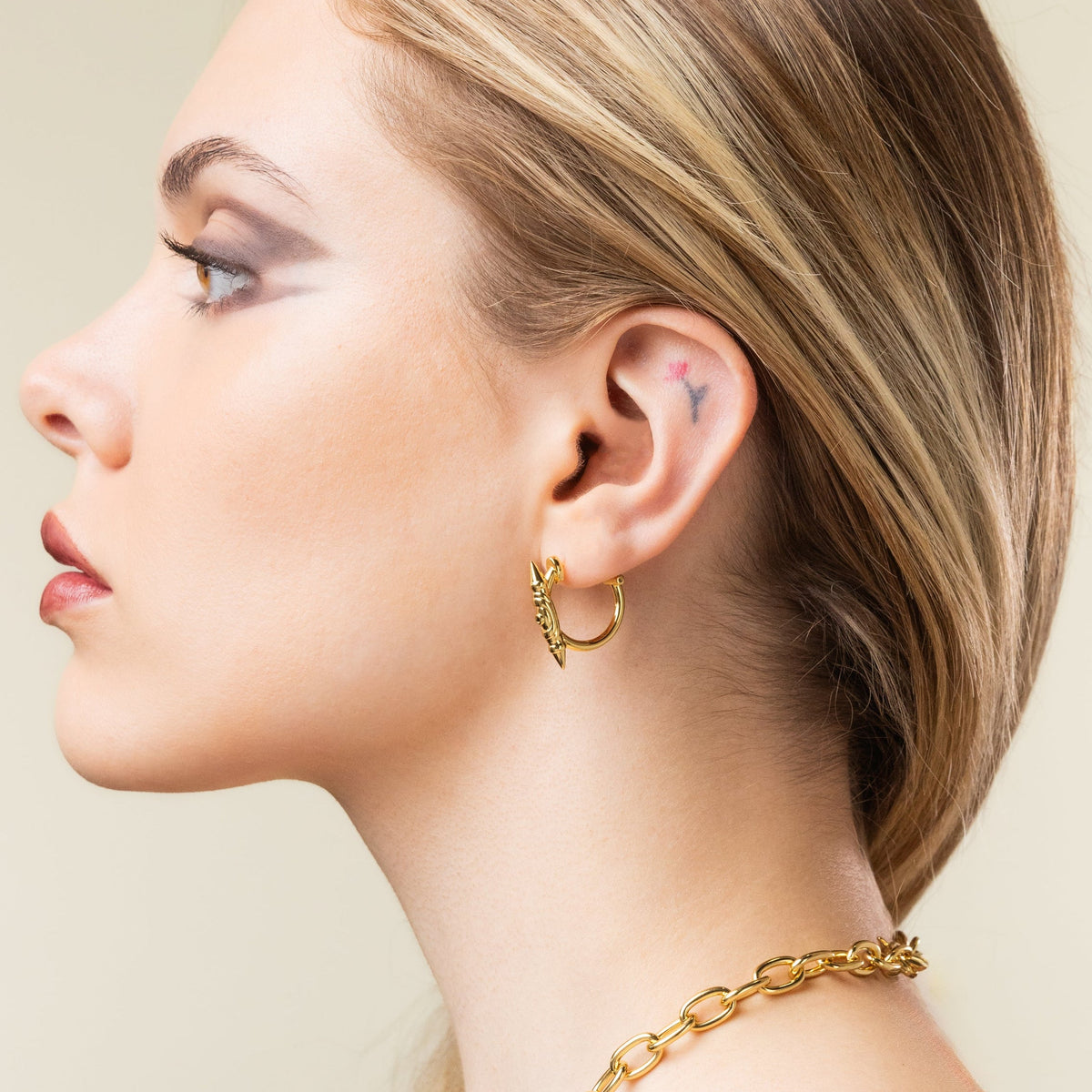 LAMINAR AXIS SPIKE EARRINGS