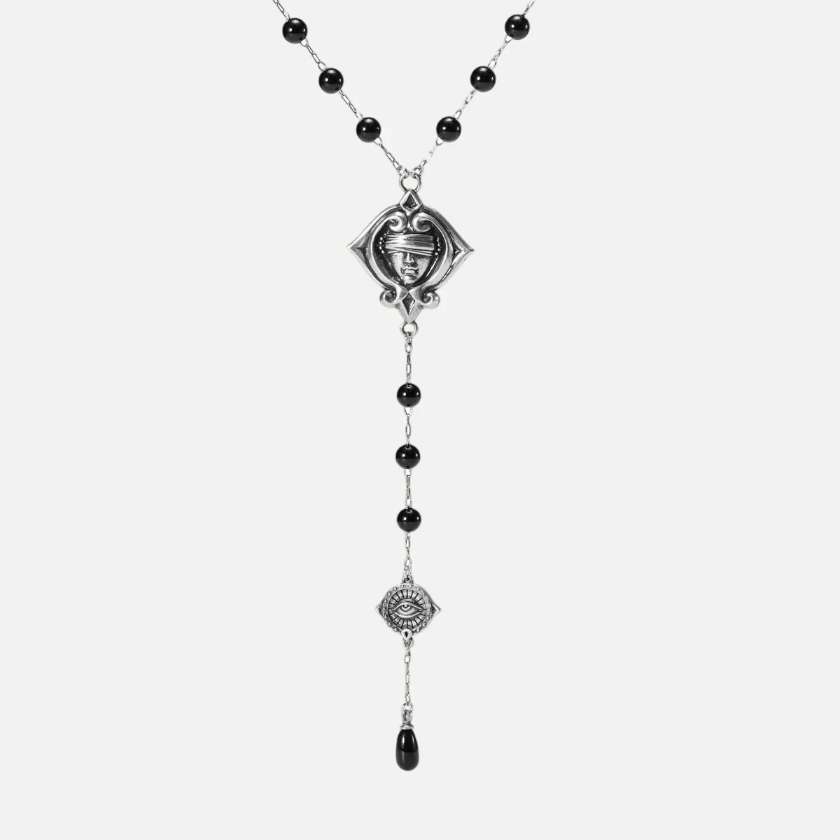 Antiqued silver-tone Second Sight Lariat Necklace with black beads, a blindfolded face motif, an eye medallion, and a black teardrop.