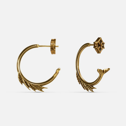 Gold Siren Crest Earrings with fin-like ridges, curved half-hoop design, and 925 silver posts on a clean background.