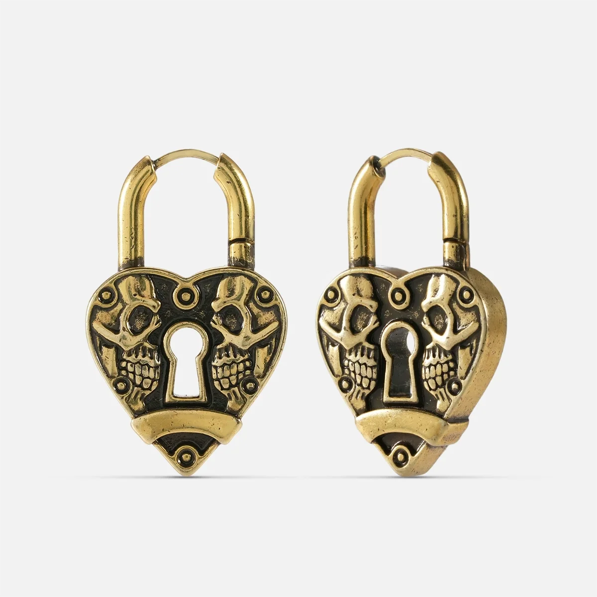 Pair of gold-tone heart lock hoop earrings with skull detailing and keyhole design, front and side view