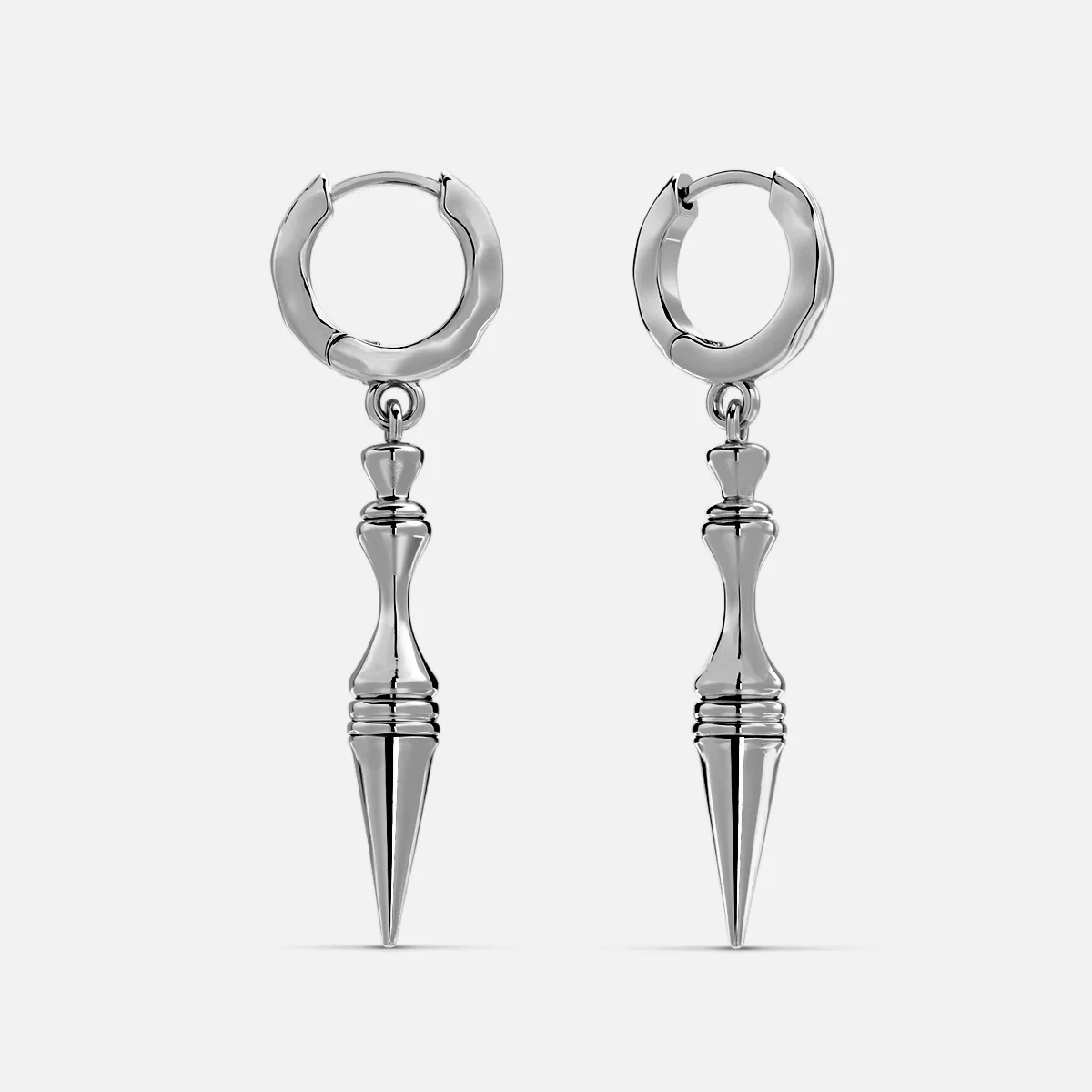 Silver-tone spear pendant hoop earrings shown as a pair against a plain background