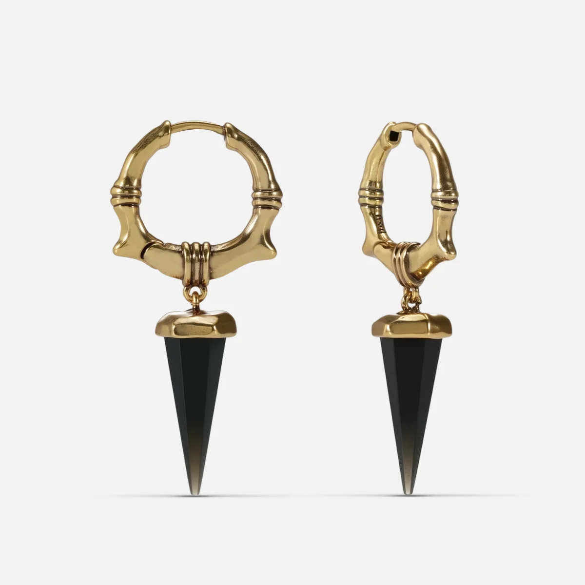 Gold-tone Unearthed Spike Earrings feature black obsidian spike drops and an antiqued finish.