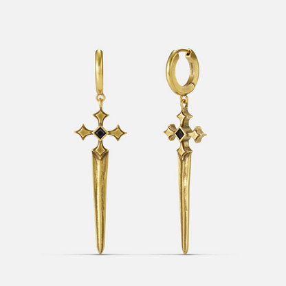 Vesper Blade Earrings in antiqued 18K gold with long blade-shaped cross drops and black obsidian, shown front and back on whi