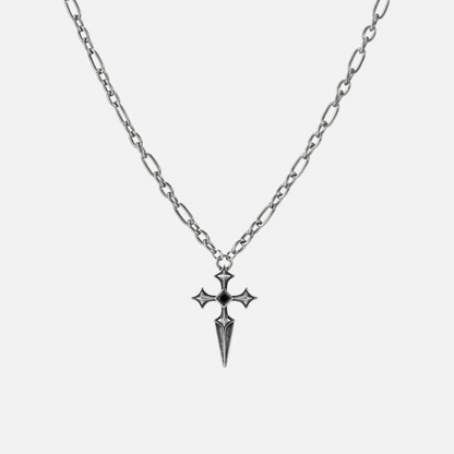 Vesper Blade Necklace in antiqued silver with a blade-shaped cross pendant and black obsidian, shown full length on white.