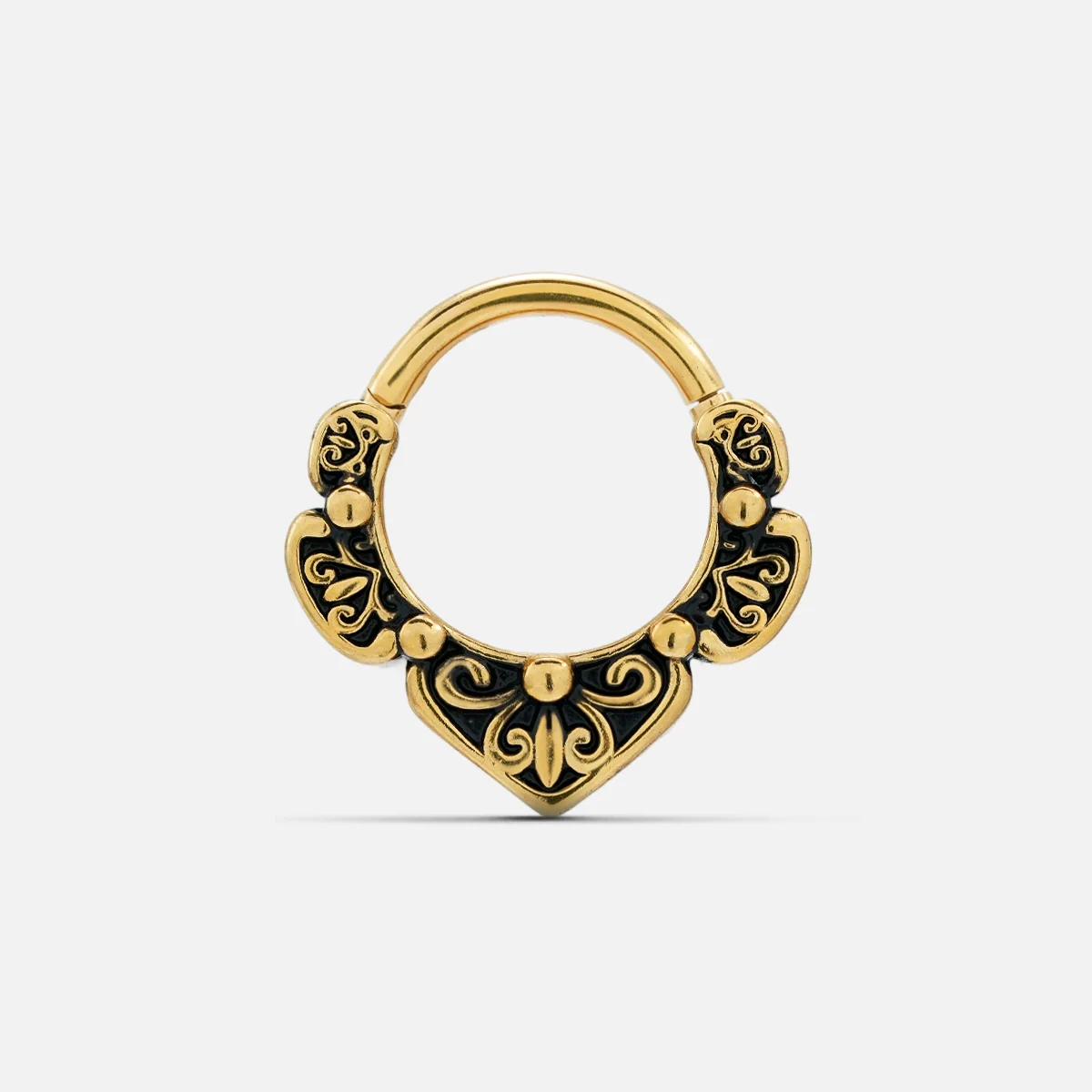 Gold-tone Victorian Bloom septum clicker with black recessed accents and ornate symmetrical scrollwork