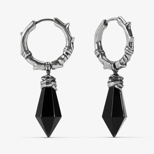Silver Wrapped Relic Earrings with black obsidian dagger drops, hammered hoops, and wire-wrapped relic details on a clean background.